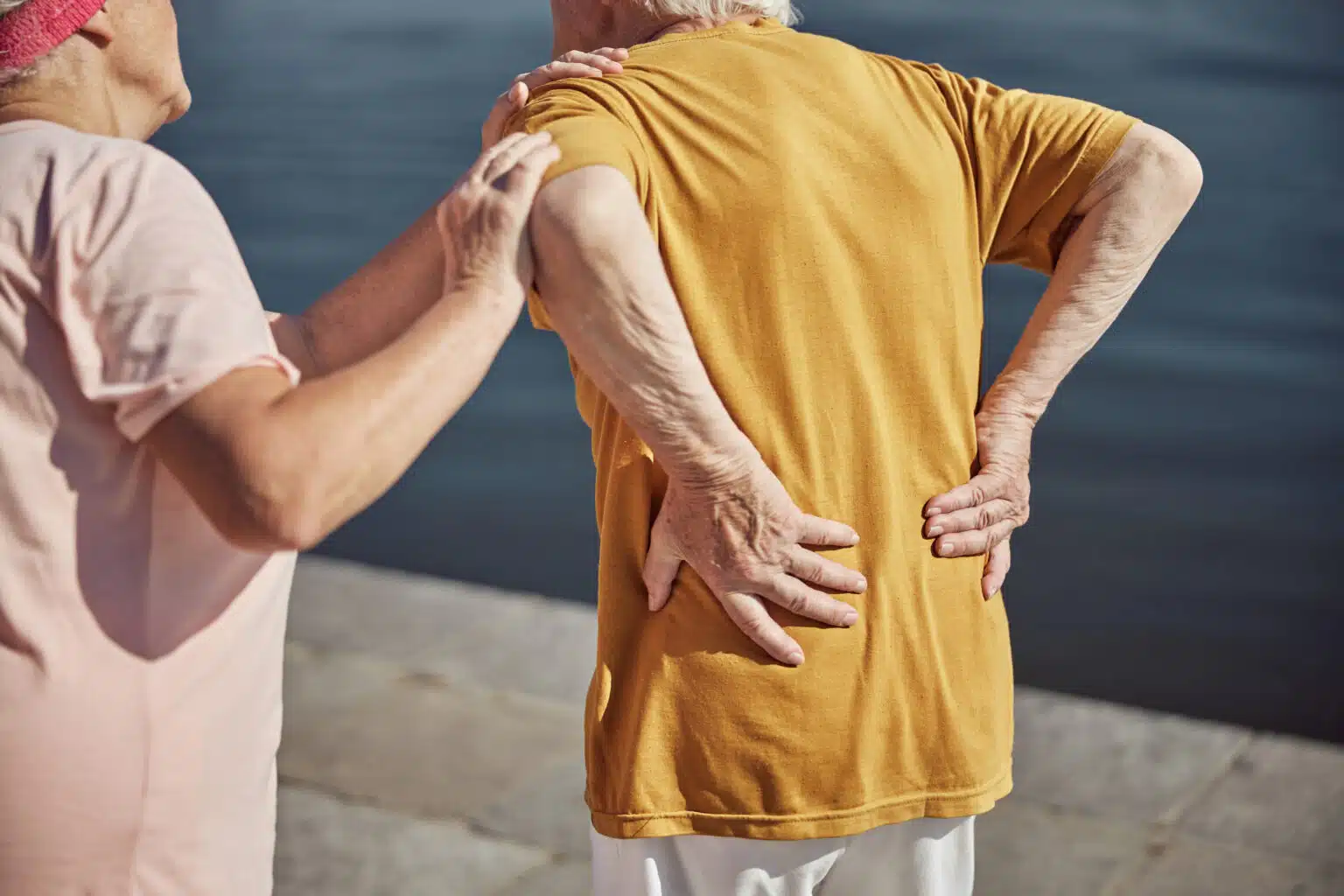 elderly man with chronic back pain