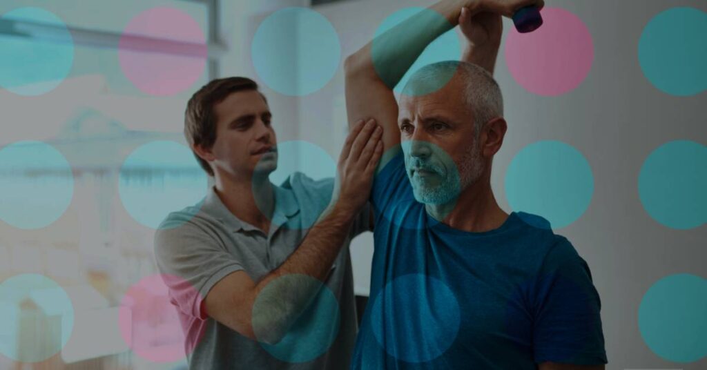 A physical therapist assisting an elderly man with his shoulder exercise